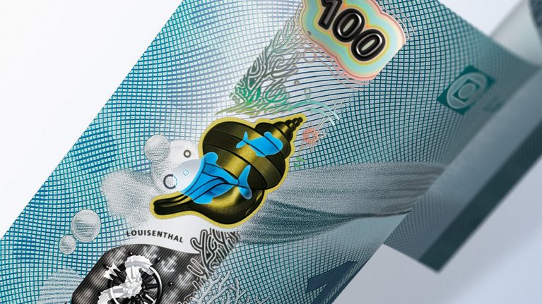 Close-up of a banknote with security window and other visual effects
