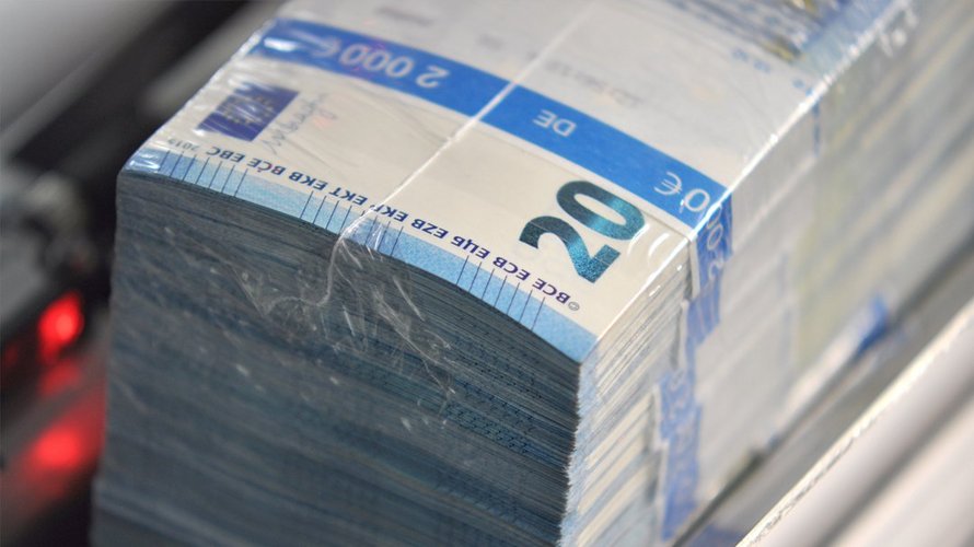 A stack of 20€ bills wrapped in plastic foil